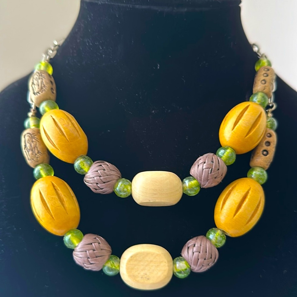 MA Gaines double stranded necklace with wooden beads.